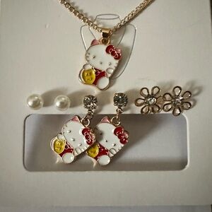 Jewelry inspired by Hello Kitty!!!
3 pair earrings, one necklace per set.